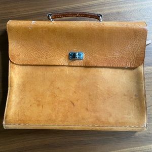 Authentic veg tanned naked leather briefcase.